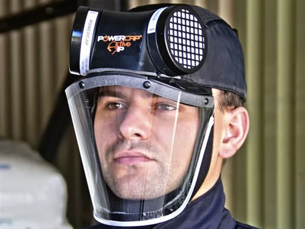 Worker wearing a JSP PowerCap® Active™ Powered Air Respirator